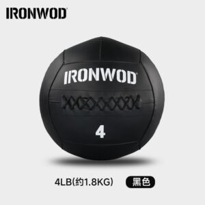 IronWOD PVC Medicine Balls heavy duty textured non slip textured gym slam balls for functional fitness wall workouts stacked in a gym.