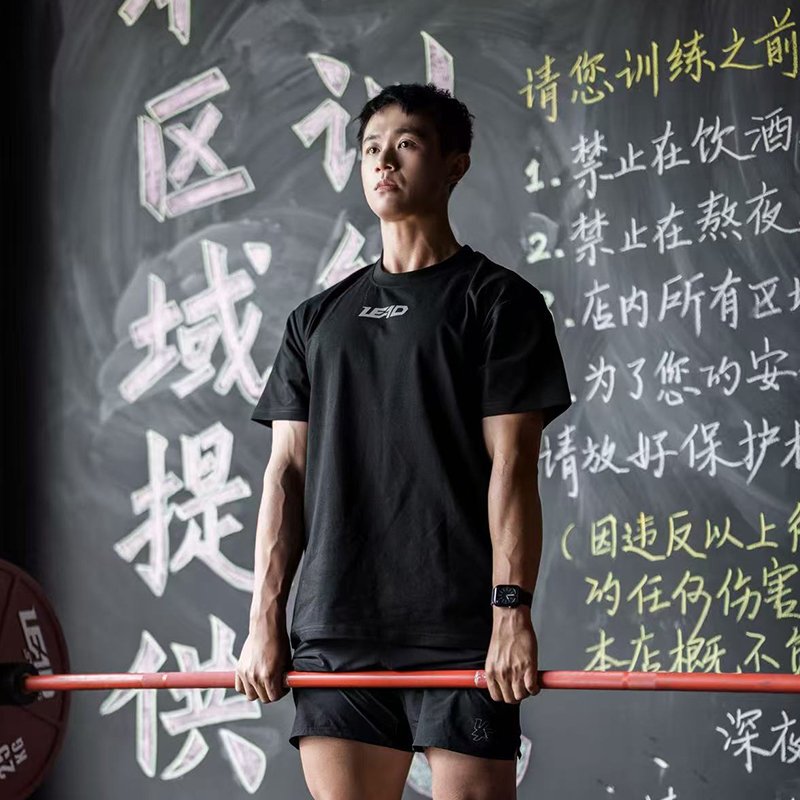 Anti-Slip T-Shirt 2 Anti-Slip T-Shirt athletic performance top with textured high friction grip print pattern across the upper back and shoulders.